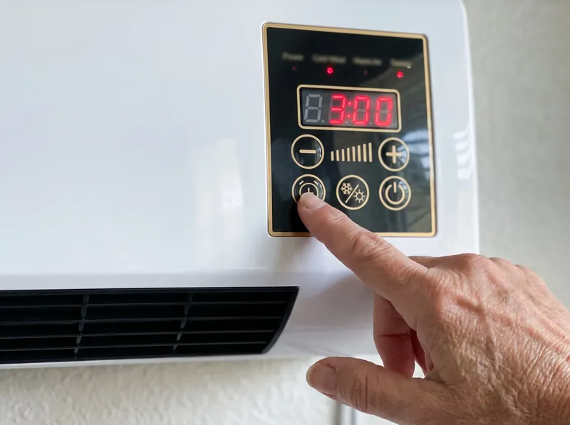 Pressing the timer button on Power Heat Pro