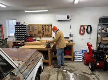 Garage workshop with Power Heat Pro above the workbench